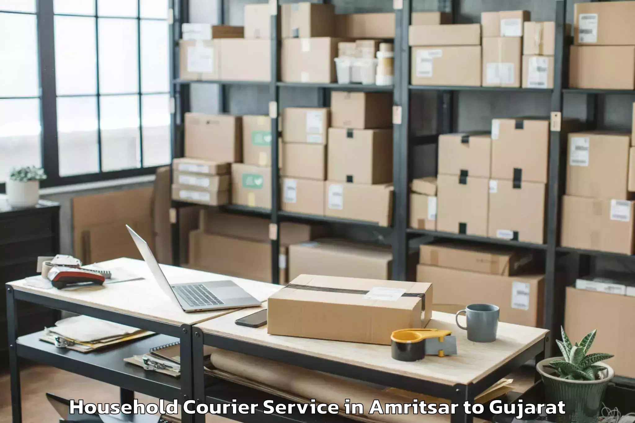 Reliable Amritsar to Dantiwada Household Courier